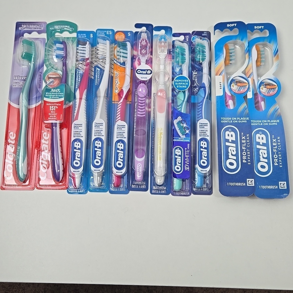 11 NWT Oral B Toothbrushes